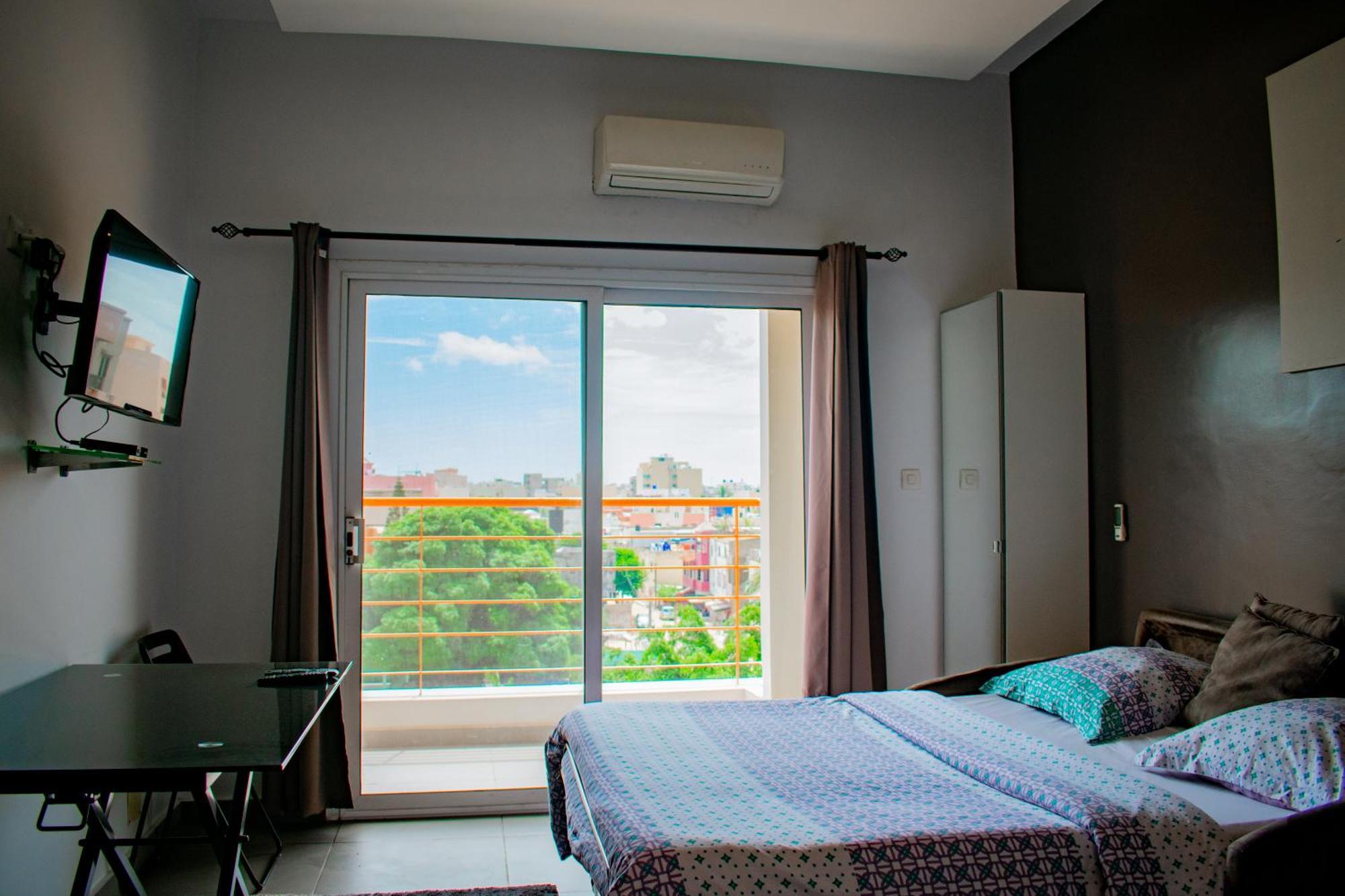 Apartamento Le First Concept Dakar Exterior foto